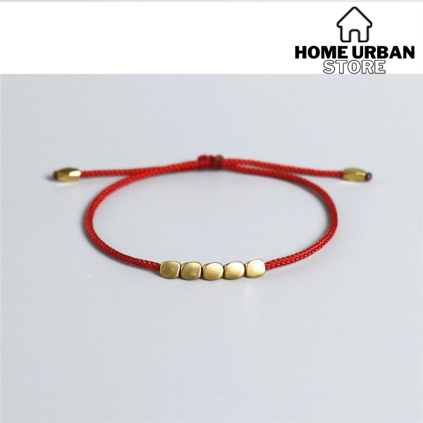 Pulsera Tibetana Hilo Rojo con Cobre